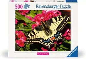 A puzzle with the words “Ravensburger Puzzle” at the top and the number ‘500’ along the left side of the white bordered cover.  Below is an image of the finished puzzle, which features an up-close photograph of a primarily yellow and black striped butterfly perched atop a magenta flower.