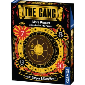 A board game titled "The Gang: More Players Expansion" in black font within a gold border across the top of the cover.  The art features a black background colored predominantly with red and gold and depicts a large bank safe and red and black 6 sided dice.
