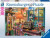 A puzzle with the words "Ravensburger Puzzle" and the number '1000' at the top of the white bordered cover.  In the center is a picture of the completed puzzle, which features a feel-good image of a sewing shed with a mannequin, sewing supplies strewn about, a curled up kitten, and a window overlooking a garden path leading to a little gate.