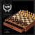 Black box featuring the We Games logo and an ornate wooden chess set with all chess pieces in the opening position. One drawer is open to display the storage space.