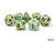 A set of 7 oversized polyhedral dice with differing numbers of sides made with a swirl of light green, cream, and yellow resin and with dark green numerals. A set of 7 oversized polyhedral dice with differing numbers of sides made with a swirl of light green, cream, and yellow resin and with dark green numerals.