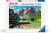 A puzzle with the words "Ravensburger Puzzle" and the number '1000' at the top of the white bordered cover.  In the middle is an image of a dock on crystaline lake with a few rowboats beside it.  A mountain range stands in the distance.