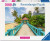 A puzzle with the words “Ravensburger Puzzle” at the top and the number ‘1000’ along the left side of the white bordered cover.  Below is an image of the finished puzzle, which features a wooden bridge with teal railings leading to a gazebo and surrounded by a tropical forest on one side and a sandy beach on the other.