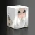 A deck box with wrap-around artwork of the wizard Saruman: a man with long, white hair and a matching beard that sports shockingly dark eyebrows, a long staff, and white robes.  His expression is rather cranky.