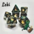 A set of dark green and black swirled polyhedral dice with golden numerals and cats on one side instead of numbers.  In the bottom right corner is a cartoon of a green cat with golden stripes along their back.  They're knocking over a big tankard filled with mead with a gleeful expression.
