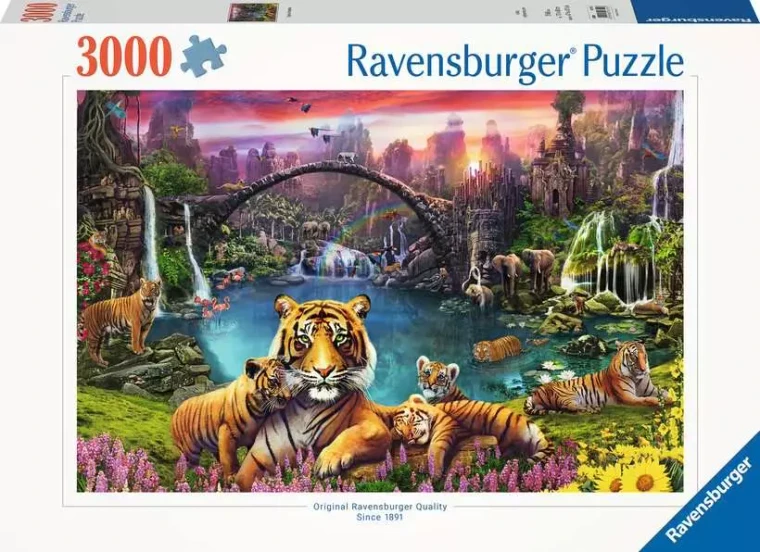 A puzzle with the words “Ravensburger Puzzle” at the top and the number ‘3000’ along the left side of the white bordered cover.  Below is an image of the finished puzzle, which features a pond-side, tropical scene with two Bengal tigers.