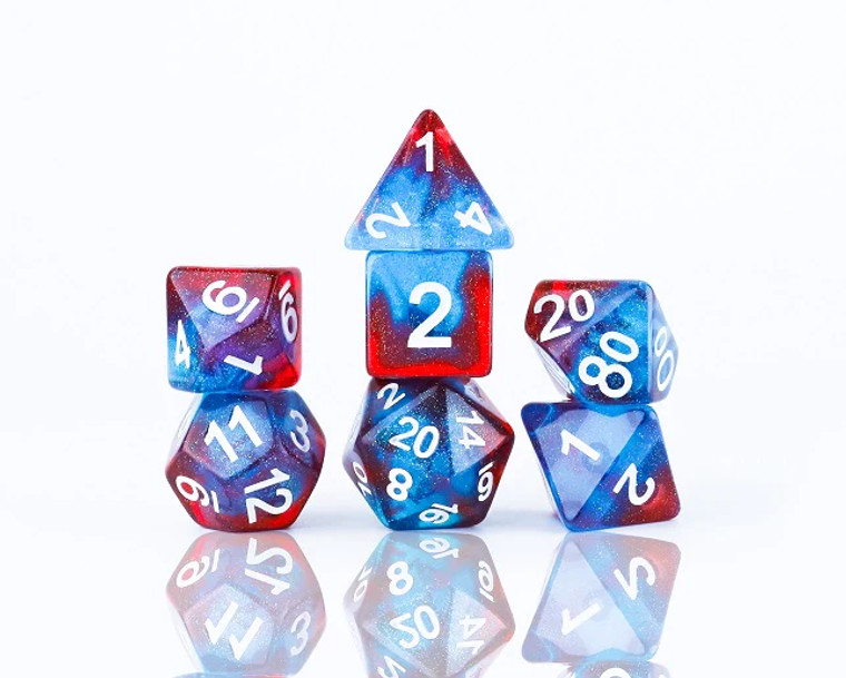 A full set of Sirius Dice with red and blue coloring and sparkles.