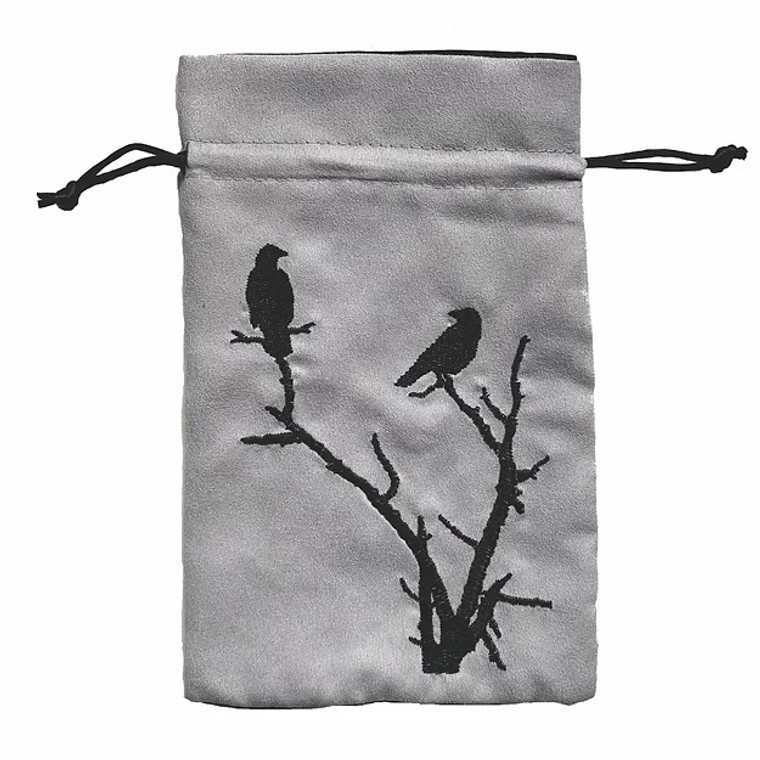 Grey dice bag with an embroidered image of two ravens perched on a dead tree in black by Black Oak Workshop.