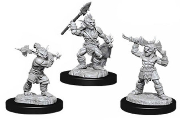 An unpainted Goblin Boss and two unpainted Goblin miniatures on a white background.