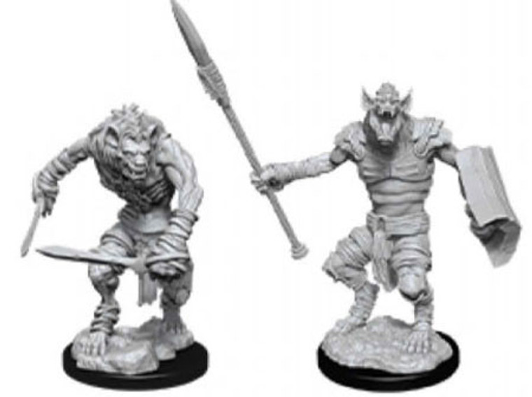 An unpainted Gnoll and Gnoll Flesh Gnawer miniature on a white background. The one on the left is wielding two swords and the one on the right is wielding a spear and shield.