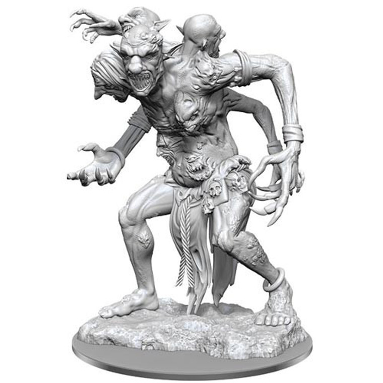An unpainted dire troll miniature with various heads and faces protruding from its body on a white background.