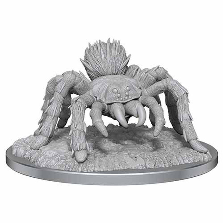 An unpainted giant spider miniature on a white background.