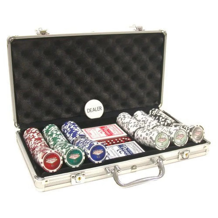 A padded aluminium Poker case with 6 rows of Poker chips in different colors, 2 decks of cards - one red and one blue - and red 6 sided dice.  The case is open to display the inner contents, and the chips are angled up.  Propped up on the lid is a white chip that reads 'dealer'.