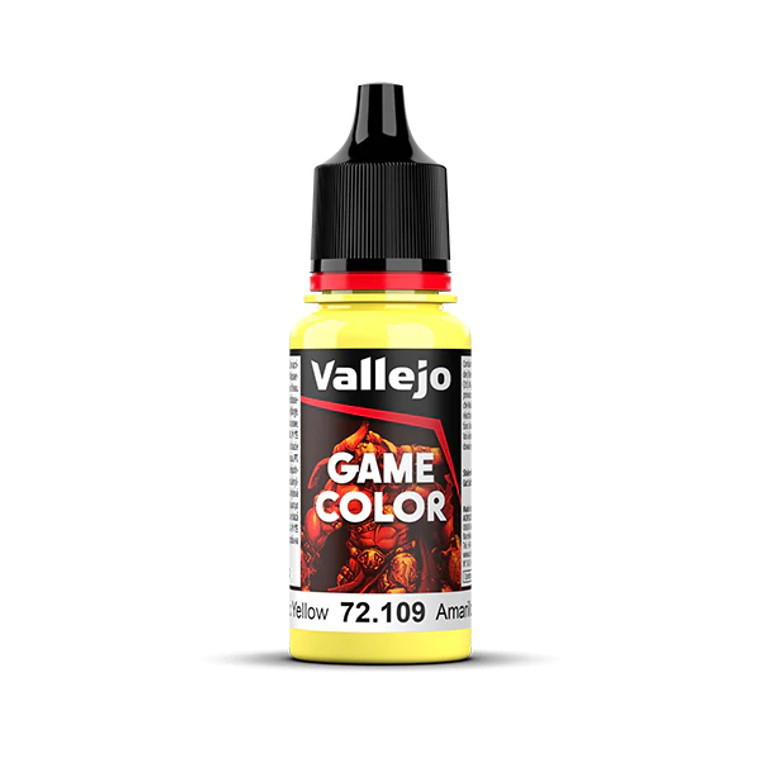 Vallejo Game Color paint bottle with product name and an image of a demon in the background. The Toxic Yellow color of the paint is visible in the clear plastic sections.