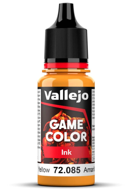 Vallejo Game Color paint bottle with product name and an image of a demon in the background. The ink-yellow color of the paint is visible in the clear plastic sections.