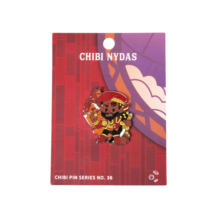 The Chibi Nydas Okiro pin placed on one section of the floating city of Avalir tableau. The pin features Nydas and the dragon spirit Sha'korzhan.