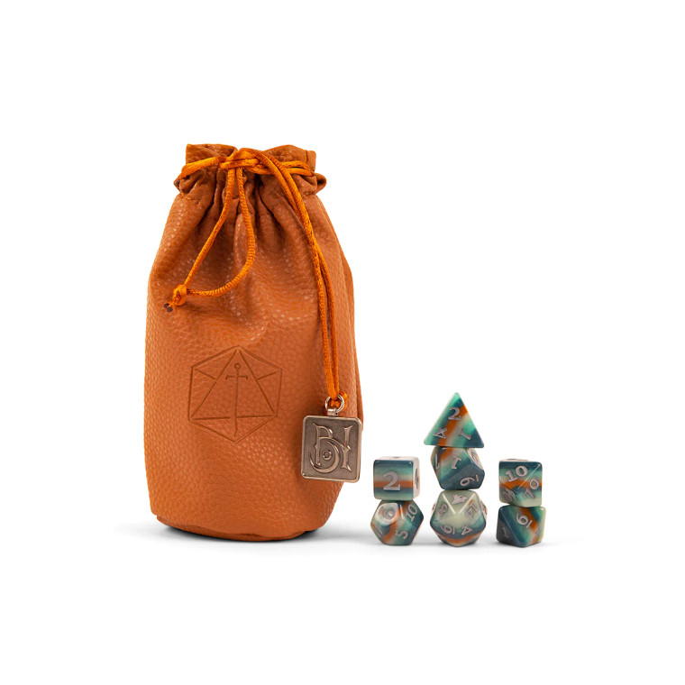 Light brown leather-like bag with an embossed Critical Role logo and a Bells Hells charm. To the right of the bag are a set of 7 dice multicolored in wavy shades of green, grey, and gold with cool grey numbering.