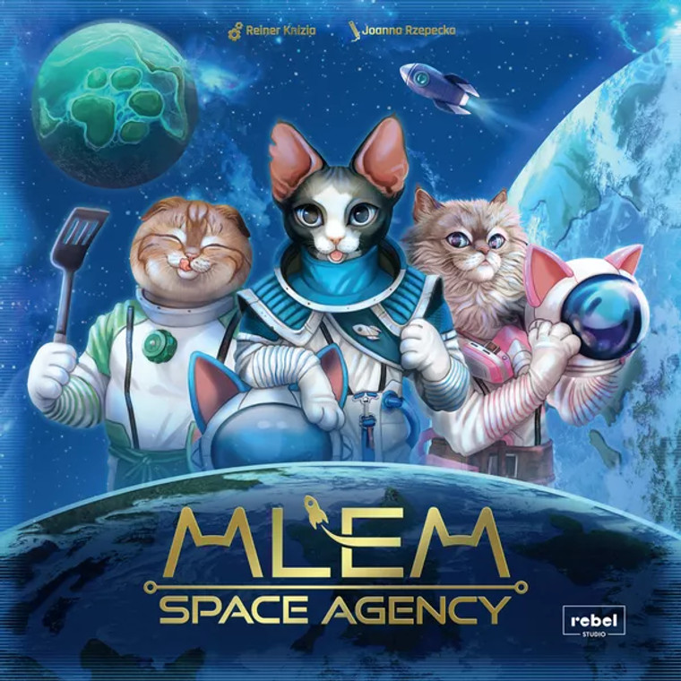A board game titled "MLEM: Space Agency" in metallic gold font, the two 'M's being shaped like the tops of cats' heads.  The art depicts a movie poster-worthy line up of the brave kitty astronauts that dare to reach their paws for the stars.  There are three depicted here, from left to right: a scottish fold with light brown fur, tabby stripes, a white and green space suit, and a spatula in hand; a sphynx cat with a white nose, black spot on its ears and cheeks, and a white and blue space suit that they prop their elbow atop the helmet of (which sports a pair of ears atop for their own to slot into); A ragdoll variant with a light cream coat, wearing a white and pink space suit, and holding their helmet aloft.  Below and beside the trio are planets ringed in light,  above flies a bullet-shaped rocket, and behind them looms the vast expanse of space.