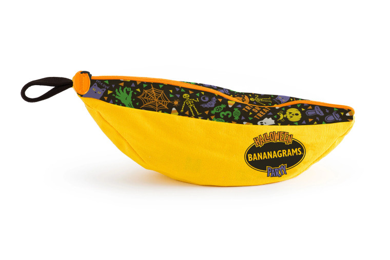 A board game titled "Bananagrams: Halloween Party" that is stored in a yellow, banana-shaped canvas bag with a zipper at the top.  Along the zipper is a black stripe with colorful candy, cobwebs, zombie hands, skeletons, bats, and other spooky décor.