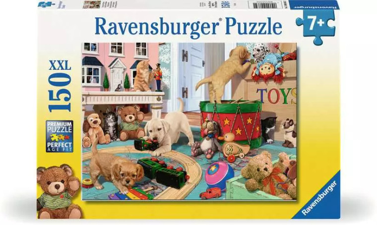 A puzzle with the words “Ravensburger Puzzle” at the top and the number ‘500’ along the left side of the white and yellow-bordered cover.  Below is an image of the finished puzzle, which features a scene from a children's play room full of puppies of various breeds playing with toys while two long-haired kittens explore a dollhouse.  A tuxedo kitten meets a plush behind a drum, while a puppy climbs the drum to do the same with a puppy plush.