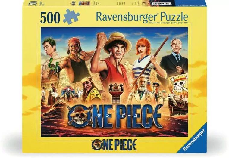 A puzzle with the words “Ravensburger Puzzle” at the top and the number ‘500’ along the left side of the yellow bordered cover.  Below is an image of the finished puzzle, which features a photo-realistic painting of a collection of characters over an ocean, each uniquely designed.  The central figure is a tan man with dark hair, a straw hat, and a smile.
