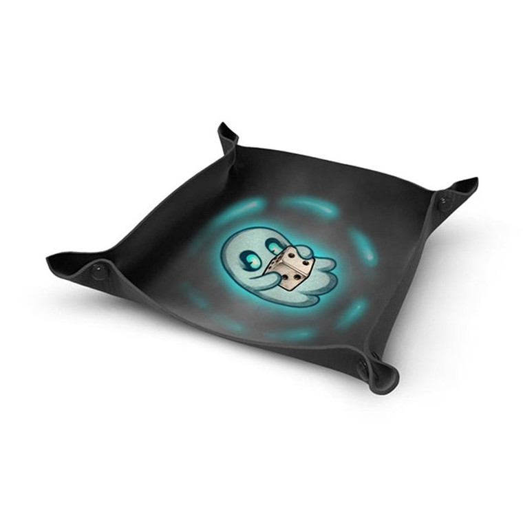 A mostly black, neoprene dice tray with black, metal, click closures on each corner.  In the center is a cartoon drawing of a little blue ghost holding a 6 sided dice.