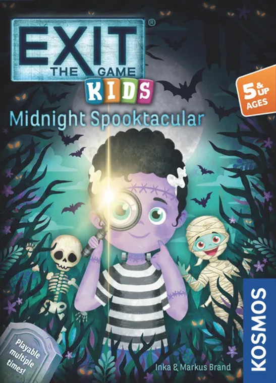 A board game titled "EXIT: Kids - Midnight Spooktacular" at the top and bottom of the cover.  The art behind the title features cartoon children that resemble several classic monsters: in the center is a little girl with purple skin and large, primarily black hair with white stripes down the sides.  A skeleton stands behind her to the left, and a small mummy stands to the right.  It's night in a forest, and the little girl in the foreground holds a magnifying glass that reflects the moonlight to her eye.