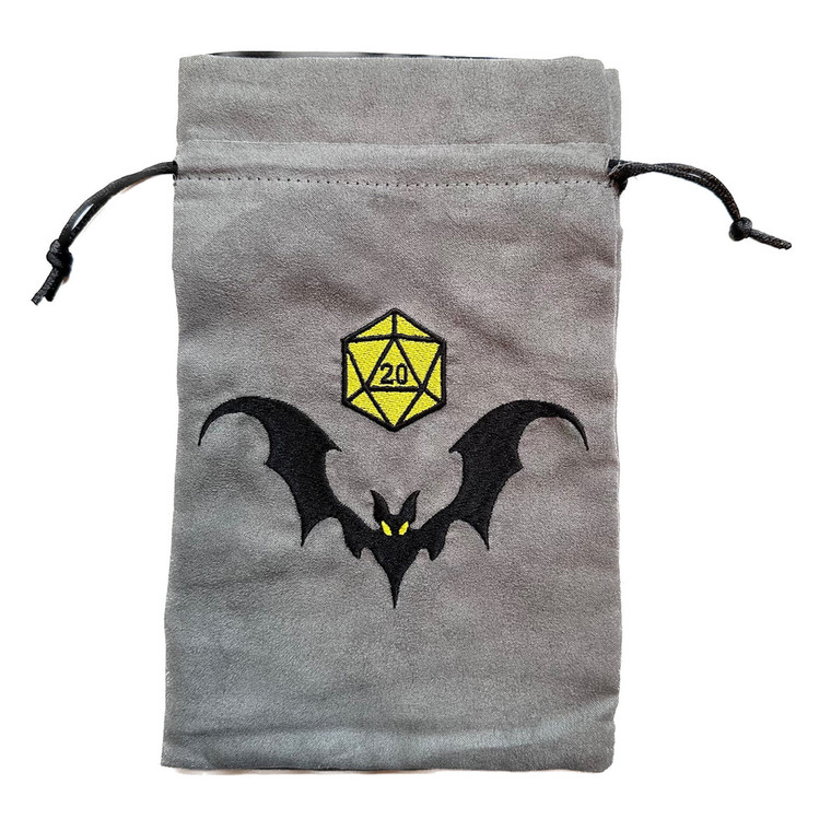 A grey dice back with draw strings and an embroidered image of a stylized black bat flying under a yellow D20.
