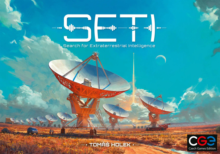A board game titled "SETI: Search for Extraterrestrial Life" across the top of the cover.  The art below depicts a group of three large satellite dishes with orange and white paint in the middle of a flat desert landscape.  Above them is a clear, vibrantly blue sky.