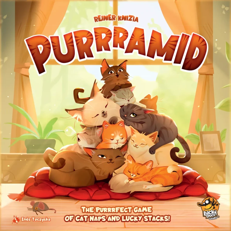 A board game titled "Purrramid" in large, orange and brown font across the top that features small, cat-like stripes.  The background of the image is a wide window with the curtains pulled aside with a beam of light. Highlighted by this is a family of adorable kittens stacked on each other in a pyramid. In front of them, a mouse toy is set to the side, waiting for play time.