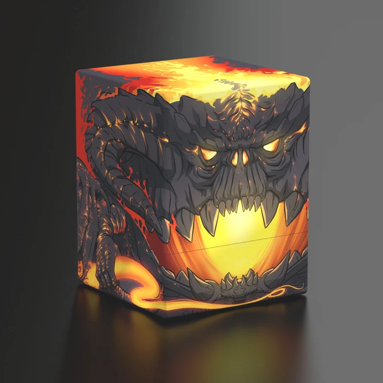 A deck box with wrap-around artwork of a demonic creature with a black, coal-like face flaming from the inside out, twin curved ram's horns leathery wings, and a glowing, fiery whip in hand.
