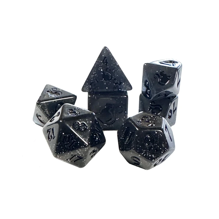 A set of 7 black, sparkly polyhedral dice with black numerals.  A cat icon sits on one side of each die, its tail curled beneath it.