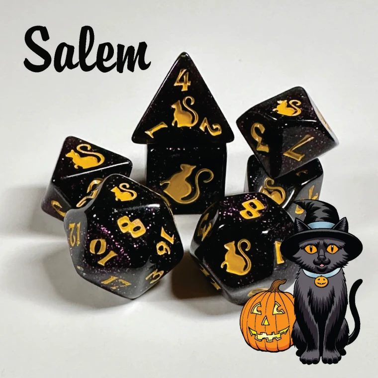 A set of seven dark purple, sparkly polyhedral dice with golden numerals and cats on one side instead of numbers.  In the bottom right corner is a black cartoon cat wearing a pointy, wide-brimmed hat and sitting next to an orange, carved pumpkin.