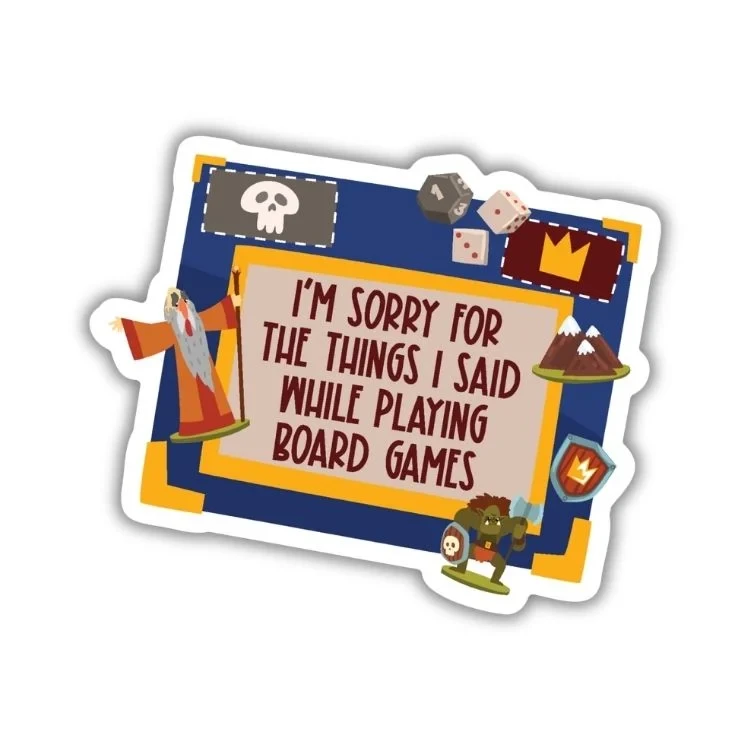 A vinyl sticker featuring a board game board with various game pieces and miniatures strewn about it.  In the center is dark red text that reads, "I'm sorry for what I said while playing board games."