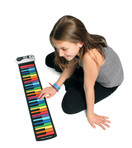 Rock And Roll It - Rainbow Piano. Flexible, Completely Portable, 49 standard Keys, battery OR USB powered. Includes play-by-color song book!