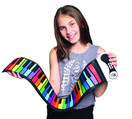 MukikiM Rock And Roll It - Rainbow Piano. Flexible, Completely Portable, 49 standard Keys, battery OR USB powered. Includes play-by-color song book!