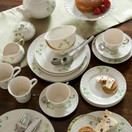 Belleek Classic Shamrock Tea Cup and Saucer Set - Collectible Irish Handmade Fine Parian China Set - Vintage Inspired Teacup and Saucer - Microwave Safe Porcelain Ceramic Tea Set - 6 fl oz