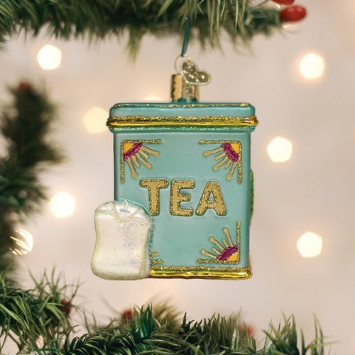 Old World Christmas Tea Tin Glass Hanging Ornament .