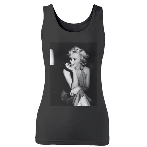 High quality print of this slim fit marilyn monroe biting nails women tank top will turn heads. And bystanders won't be disappointed - the racerback cut looks good one any woman's shoulders.