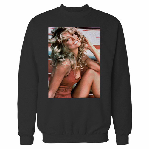 Your farrah fawcett's iconic red swimsuit crewneck sweatshirt just got an update. This super comfortable and lighter weight crewneck will become your favorite go-to sweatshirt. The cozy spandex cuffs and waistband make this pill-resistant sweatshirt a fan favorite.And your group will look and feel their best in this premium ringspun cotton crew.