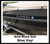 Boat registration decal on boat in Arial Black font and silver vinyl