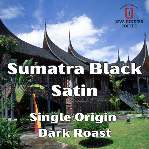 Java Junkies Sumatra Black Satin Coffee. Native buildings in Sumatra with well-groomed landscape and blue skies.