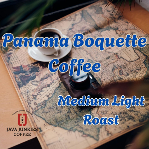 Java Junkies Panama Boquete Coffee. White coffee cup full of black coffee with a saucer sitting on a rolled-up map of Panama.