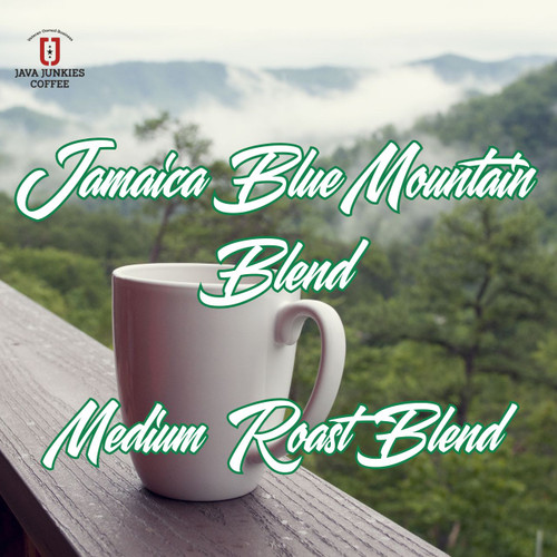 Java Junkies Jamaican Blue Mountain Blend Coffee. White coffee cup sitting on a balcony ledge overlooking the Jamaican hillside.