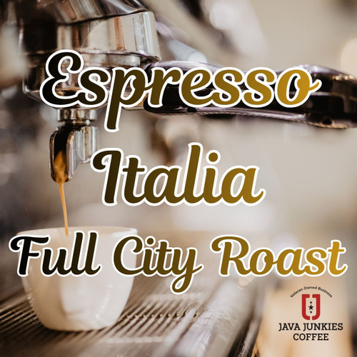 Java Junkie Espresso Italia Coffee. Espresso Machine dispensing a shot of espresso into a white coffee cup.