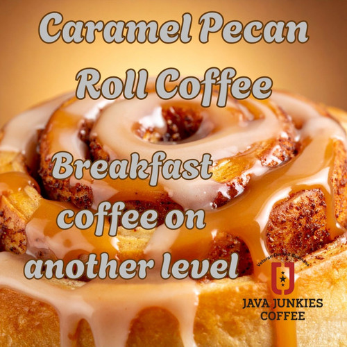 Java Junkies Caramel Pecan Roll Coffee. Large cinnamon roll with gooey icing dripping down in front of a brownish tan background.