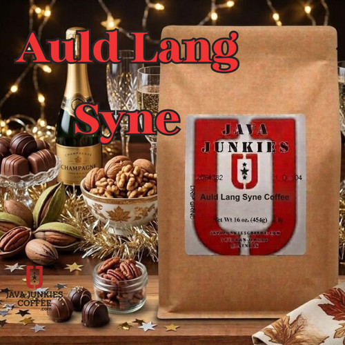 Java Junkies Auld Lang Syne Coffee.  Bag of coffee sitting on a shelf with pecans, chocolate and News Years celebration supplies.