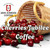 Cherries Jubilee Coffee. Tipped over basket of fresh cherries next to a festival coffee stand.