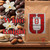 Java Junkies White Knight Coffee. Chocolate with vanilla flowers and almonds next to a bag of coffee. 