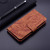 Google Pixel 9 Tiger Embossing Pattern Flip Leather Phone Case - Brown